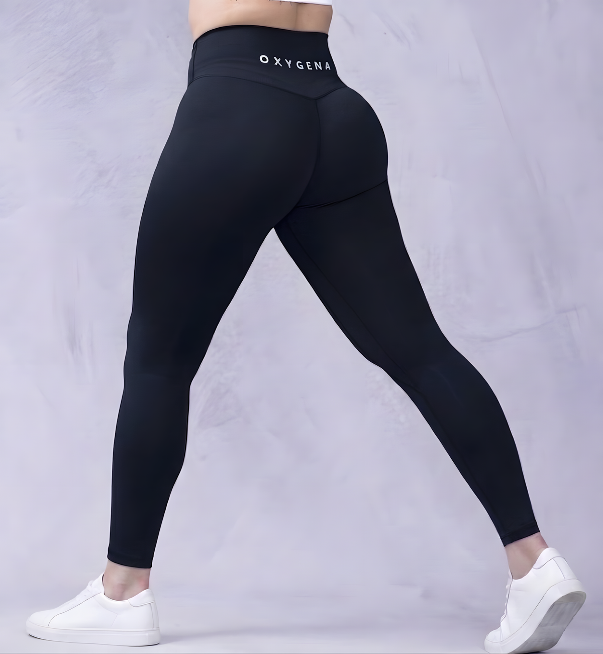 Mila high-waisted yoga leggings in Midnight Black, shown on model