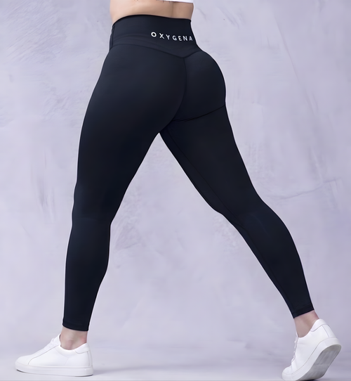 Mila high-waisted yoga leggings in Midnight Black, shown on model