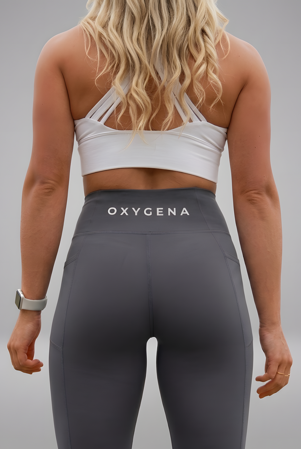 Valerie compression leggings in Charcoal Gray, worn for training