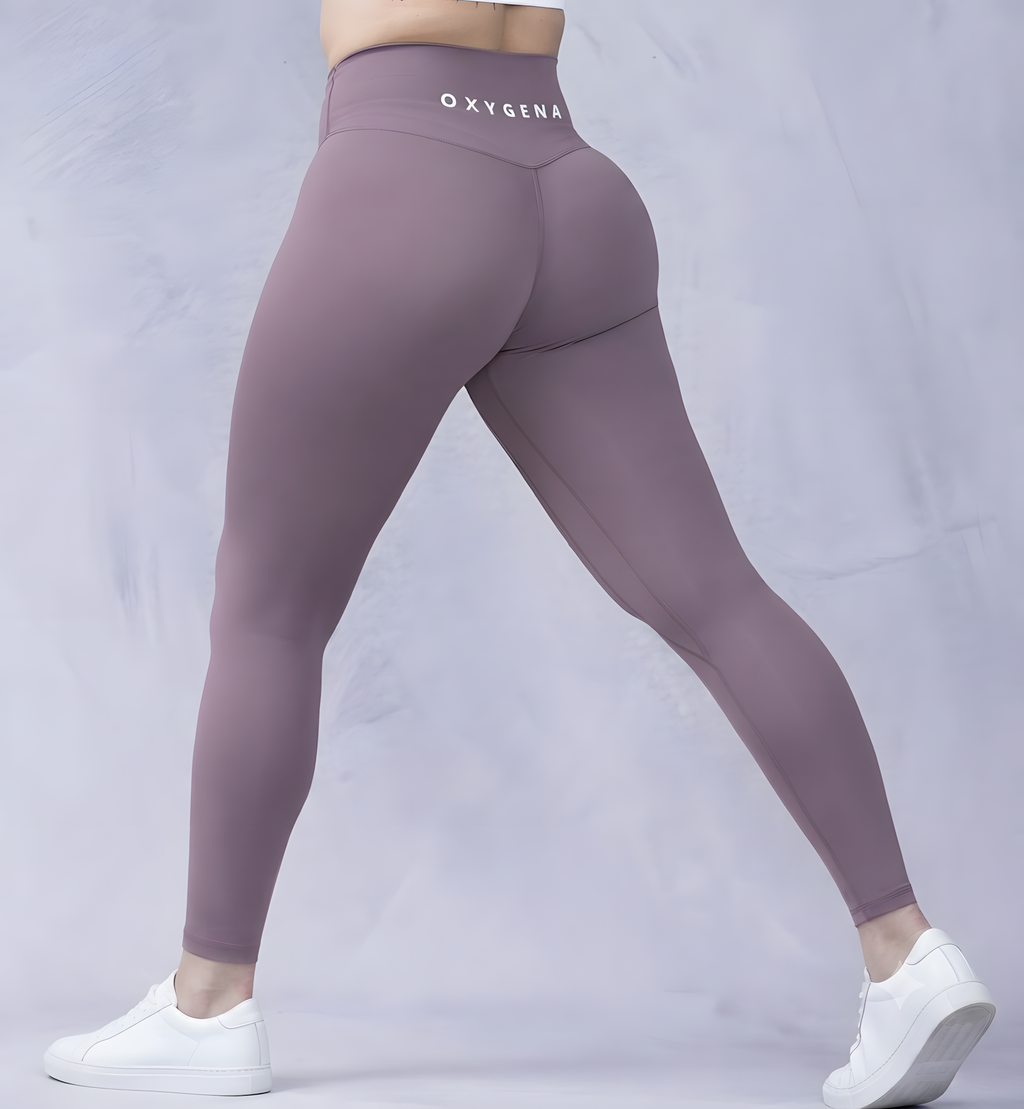 Mila high-waisted yoga leggings in Purple, shown on model