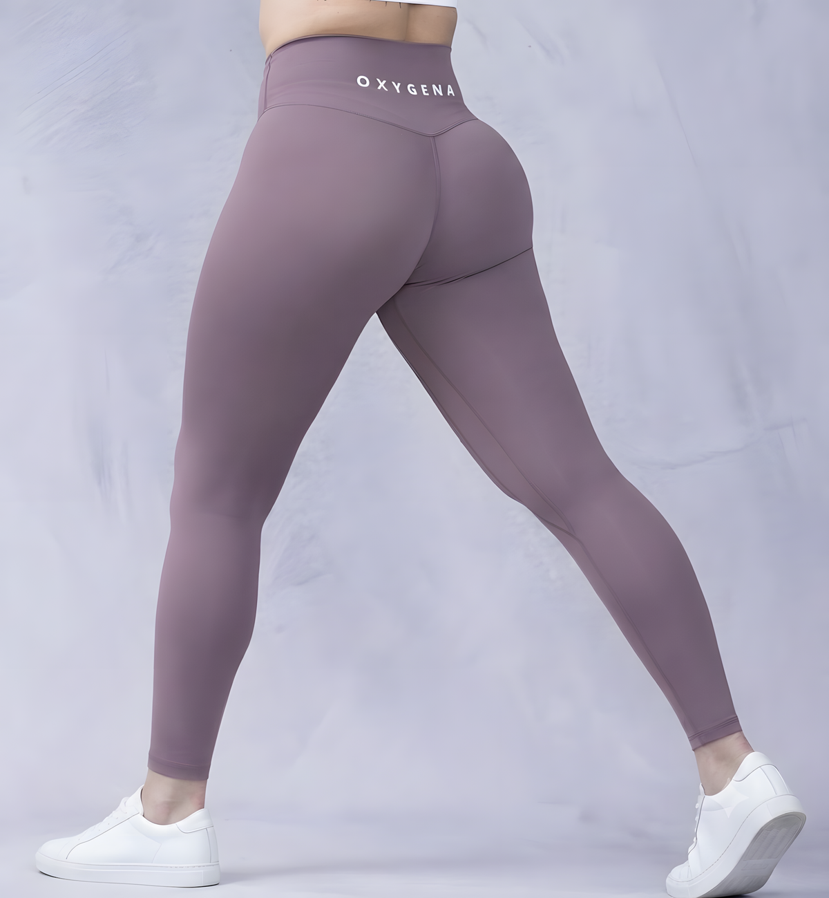Mila high-waisted yoga leggings in Purple, shown on model